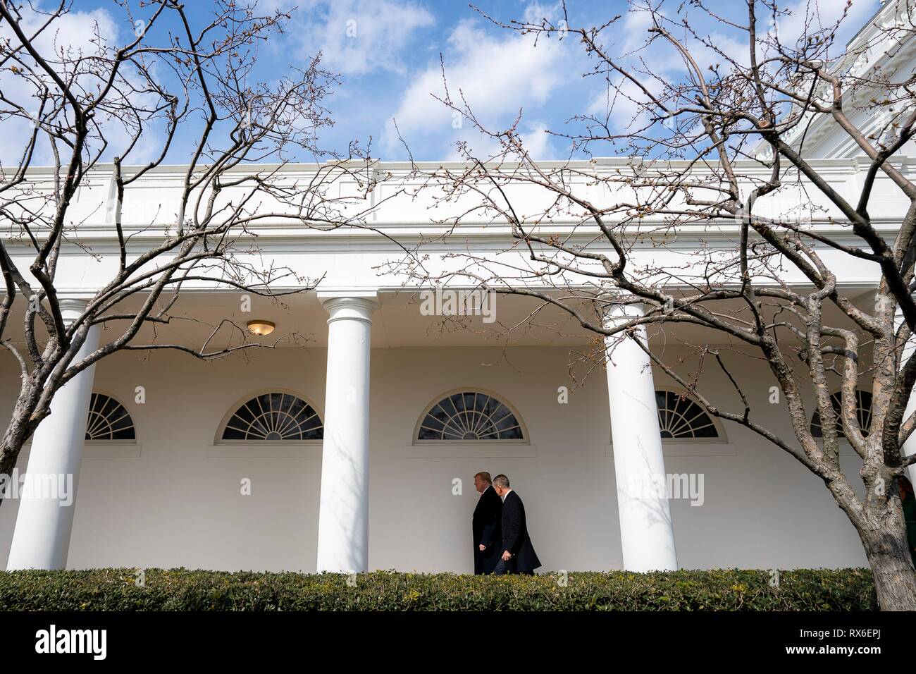 U.S President Donald Trump escorts Czech Prime Minister Andrej Babis to the Oval Office along the Colonnade of the White House March 7, 2019 in Washington, DC. Stock Photo