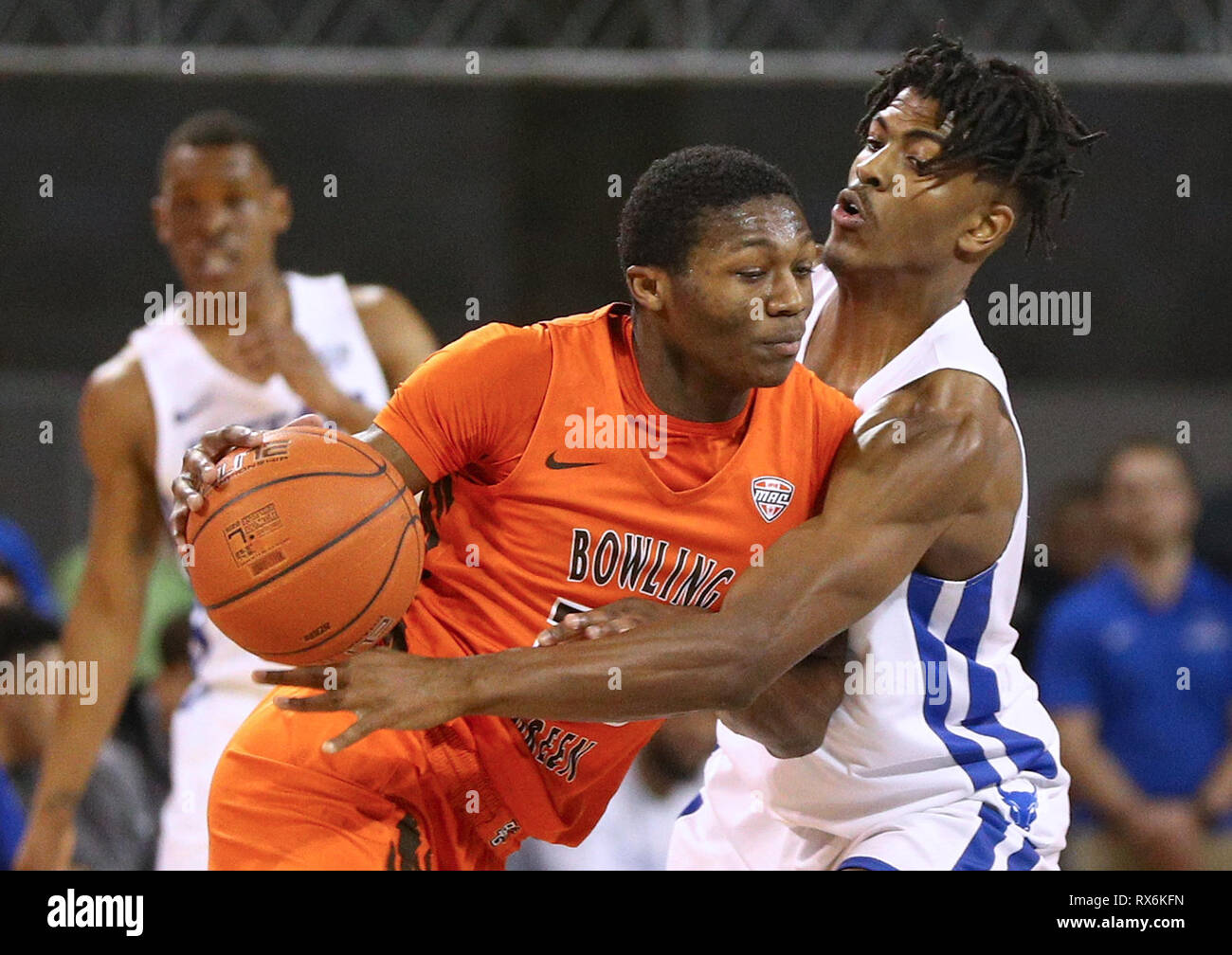 New York, USA. 8th Mar 2019. Mar 08, 2019: Bowling Green Falcons forward Daeqwon Plowden (25) shoulders his way into Buffalo Bulls forward Jeenathan Williams (11) during the first half of play in the NCAA Basketball game between the Bowling Green Falcons and Buffalo Bulls at Alumni Arena in Amherst, N.Y. (Nicholas T. LoVerde/Cal Sport Media) Credit: Cal Sport Media/Alamy Live News Stock Photo
