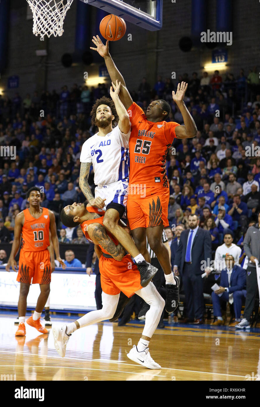 New York, USA. 8th Mar 2019. Mar 08, 2019: Buffalo Bulls guard Jeremy Harris (2) shoots the ball under pressure from Bowling Green Falcons forward Daeqwon Plowden (25) and guard Michael Laster (0) during the second half of play in the NCAA Basketball game between the Bowling Green Falcons and Buffalo Bulls at Alumni Arena in Amherst, N.Y. (Nicholas T. LoVerde/Cal Sport Media) Credit: Cal Sport Media/Alamy Live News Stock Photo