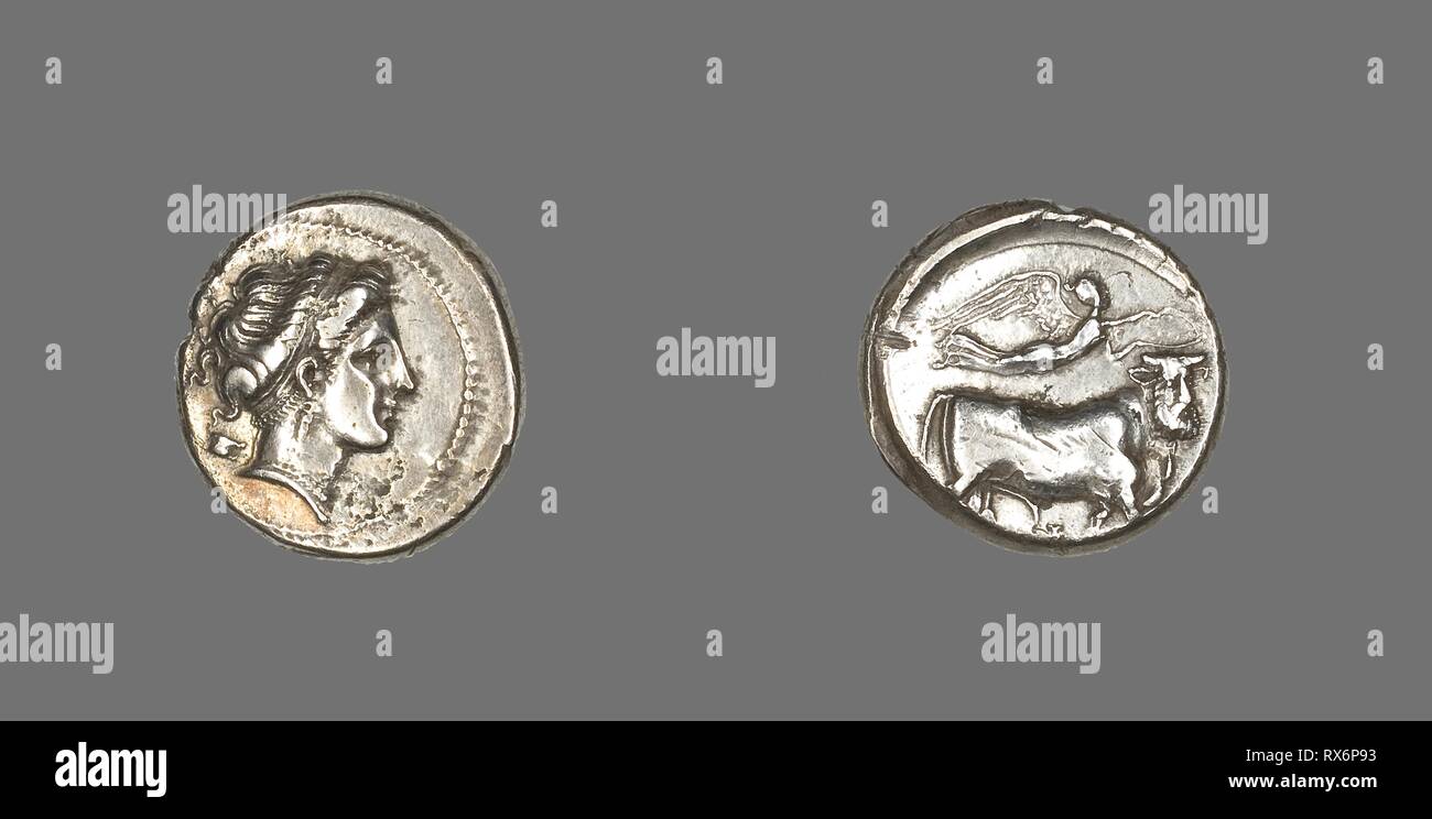 Stater Coin Depicting the Nymph Parthenope. Greek, minted in Neapolis (Naples), Campania, Italy. Date: 325 BC-241 BC. Dimensions: Diam. 2.1 cm; 7.28 g. Silver. Origin: Naples. Museum: The Chicago Art Institute. Author: ANCIENT GREEK. Stock Photo