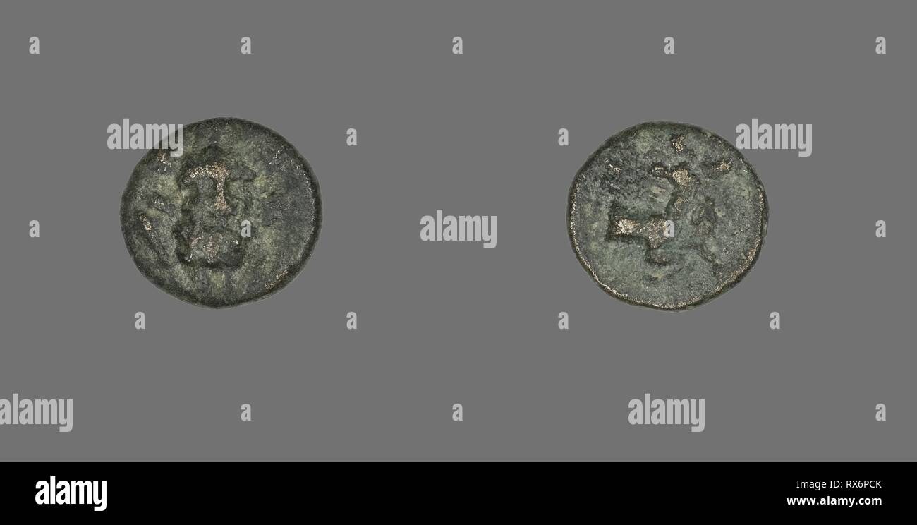Coin Depicting the Hero Herakles. Greek. Date: 200 BC-1 BC. Dimensions: Diam. 1.4 cm; 2.15 g. Bronze. Origin: Ancient Greece. Museum: The Chicago Art Institute. Stock Photo
