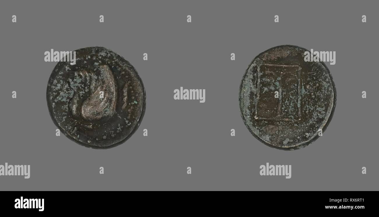 Coin Depicting Pegasus. Greek. Date: 400 BC-310 BC. Dimensions: Diam. 1.7 cm; 4.14 g. Bronze. Origin: Ancient Greece. Museum: The Chicago Art Institute. Stock Photo