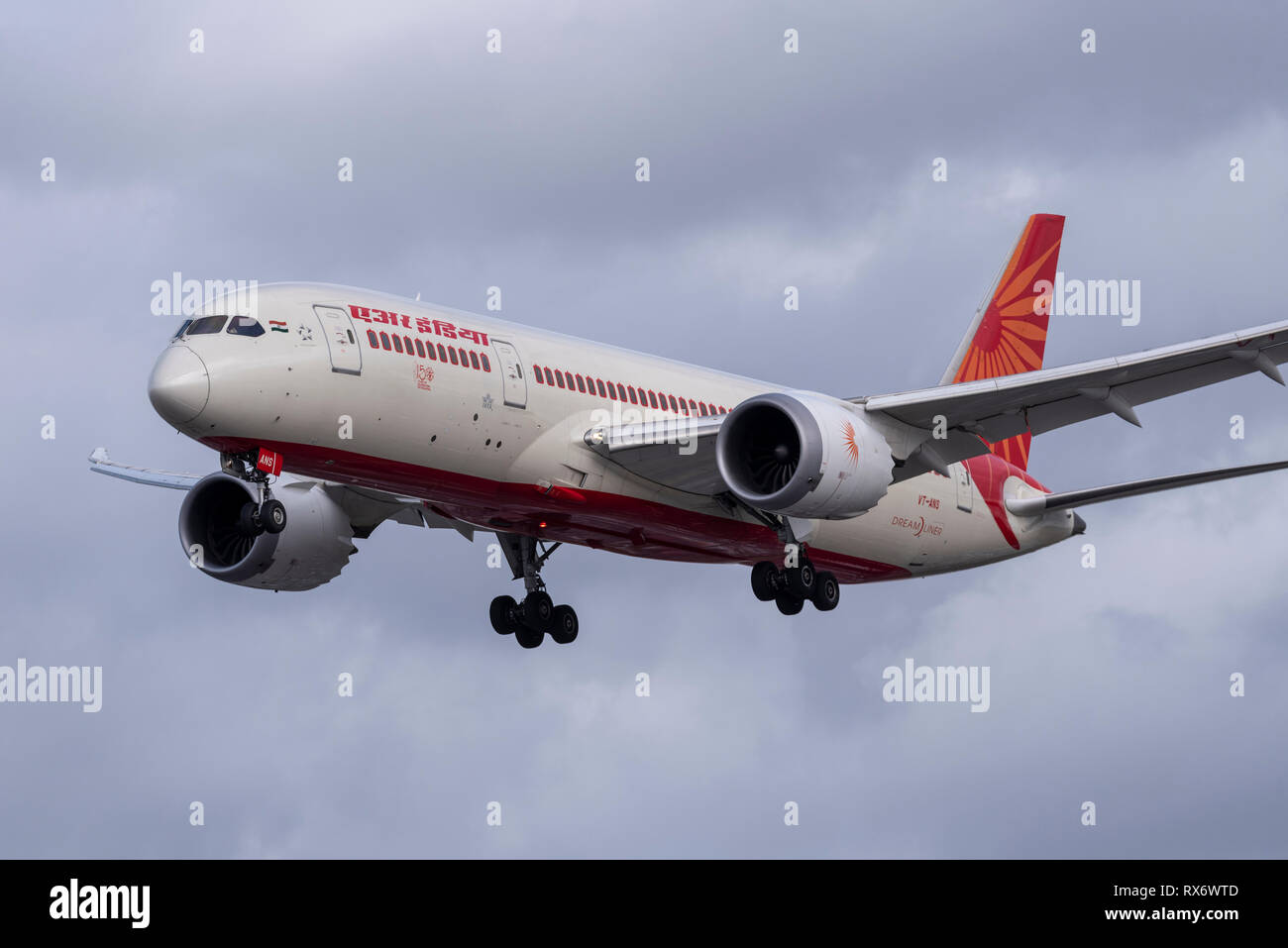 Air India Boeing 787 Dreamliner airliner jet plane on final approach to land at London Heathrow Airport, UK in cloudy weather. Landing Stock Photo