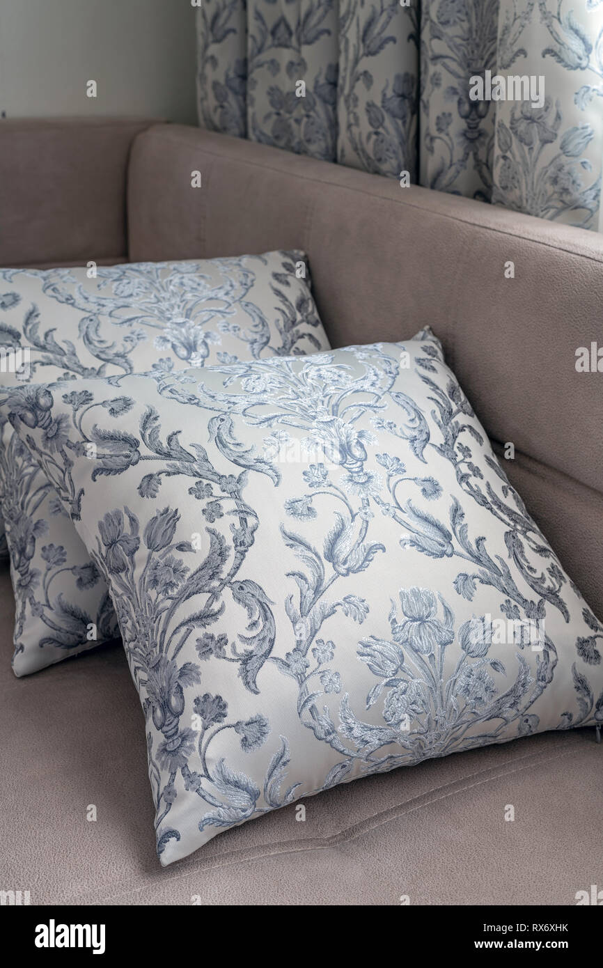 Decorative pillows and curtains of the same fabric Stock Photo