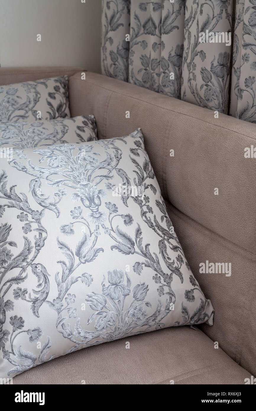 Decorative pillows and curtains of the same fabric Stock Photo