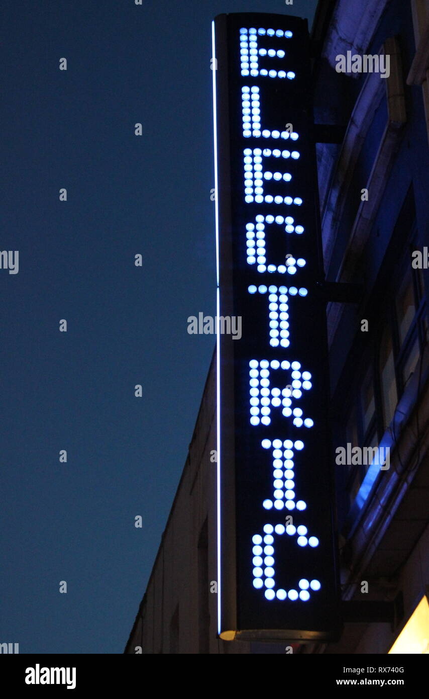 abstract image showing the word 'electric' depicted on a neon blue sign ...