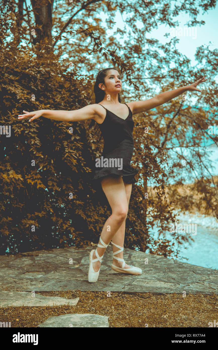 Young woman dancing in a garden Stock Photo Alamy