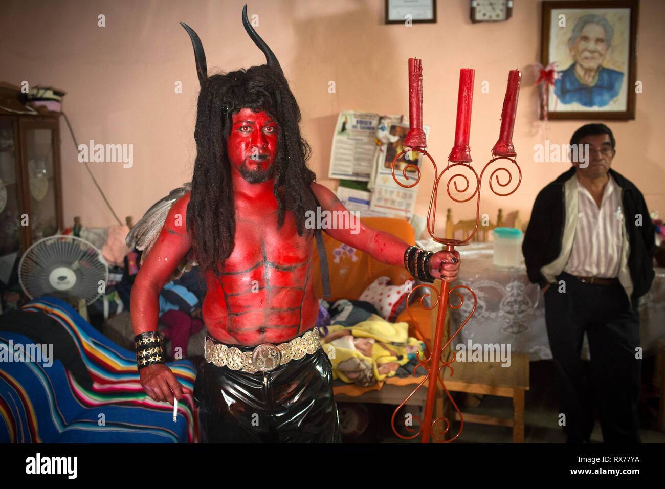 During "the muerteada" on the Day of the Dead, participants dress up in costumes representing monsters and horror characters Stock Photo