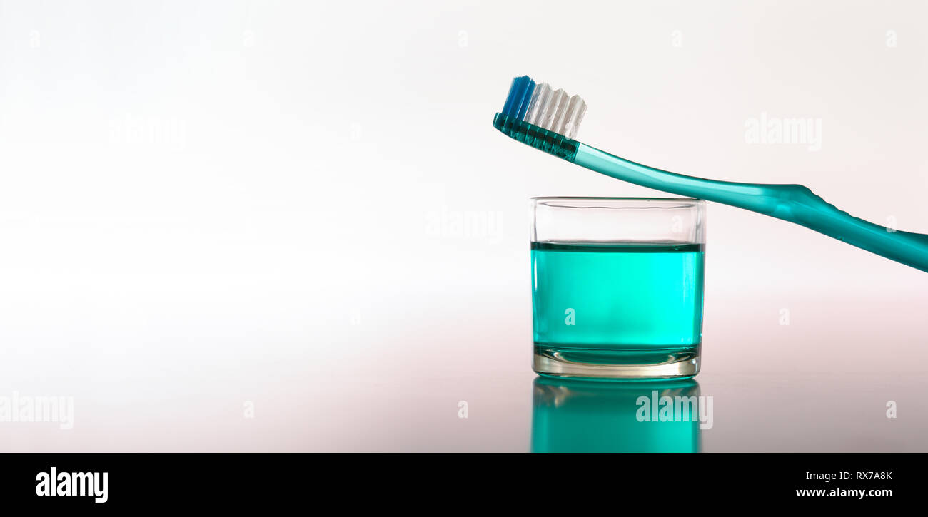 Mouth cleaning and medical insurance concept. Horizontal composition. Front view. Stock Photo