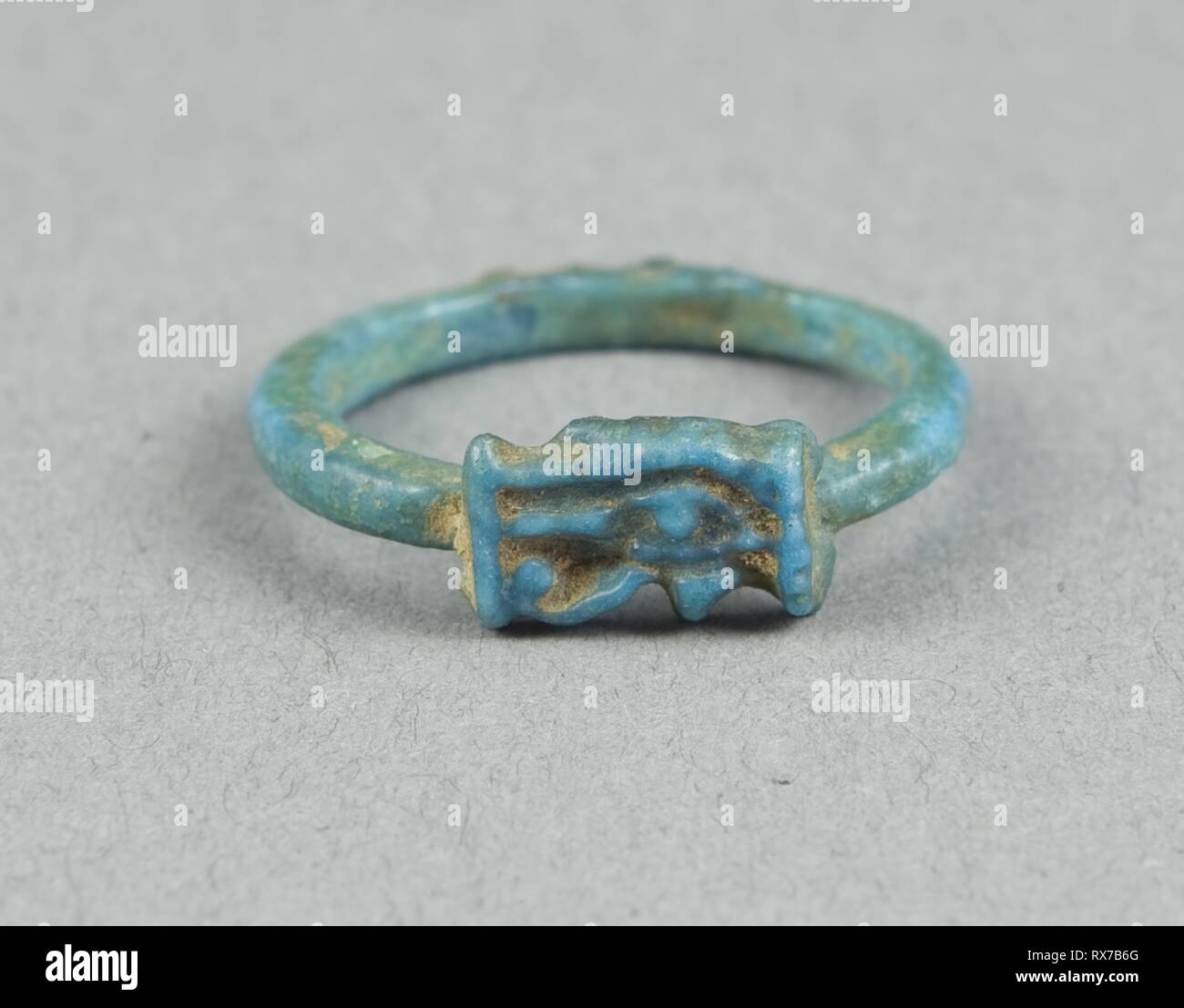 Ring: Udjat Eye. Egyptian. Date: 1325 BC. Dimensions: W. 0.6 cm (1/4 in.); diam. 2.1 cm (13/16 in.). Faience. Origin: Egypt. Museum: The Chicago Art Institute. Author: Ancient Egyptian. Stock Photo