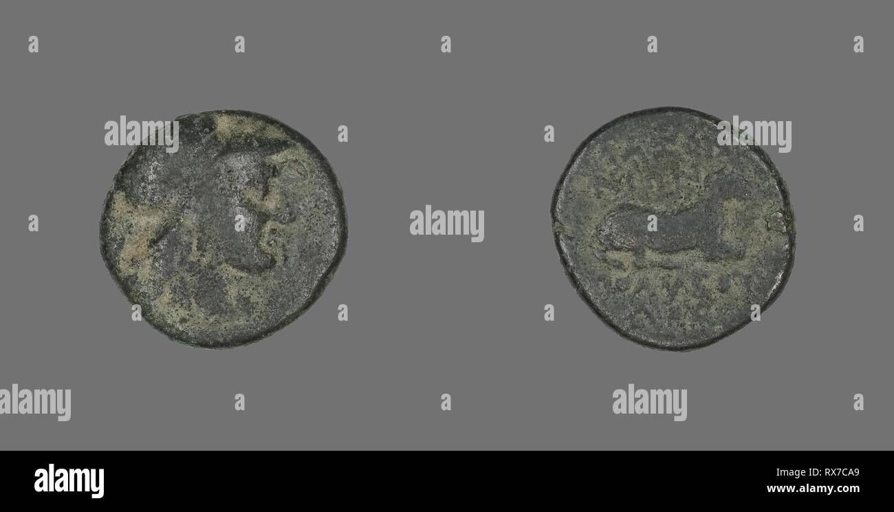 Coin Depicting the Goddess Athena. Greek. Date: 387 BC-301 BC. Dimensions: Diam. 1.7 cm; 4.09 g. Bronze. Origin: Ancient Greece. Museum: The Chicago Art Institute. Stock Photo