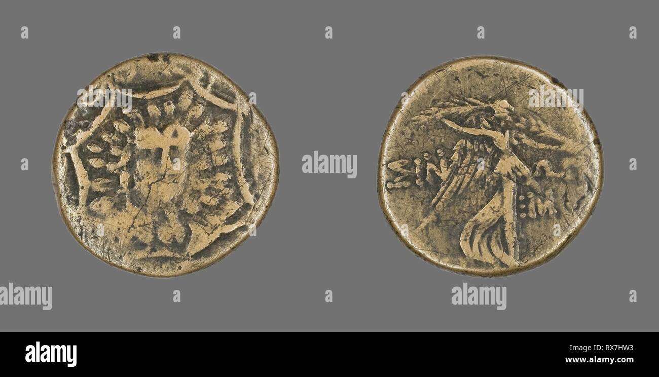 Coin Depicting a Gorgoneion. Greek. Date: 120 BC-63 BC. Dimensions: Diam. 2.2 cm; 7.09 g. Bronze. Origin: Ancient Greece. Museum: The Chicago Art Institute. Stock Photo