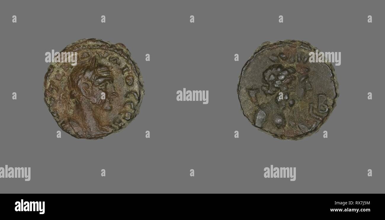 Tetradrachm (Coin) Portraying Emperor Claudius Gothicus. Roman, minted in Alexandria, Egypt. Date: 268 AD-270 AD. Dimensions: Diam. 2.1 cm; 9.20 g. Billon. Origin: Egypt. Museum: The Chicago Art Institute. Author: Ancient Egyptian. Stock Photo