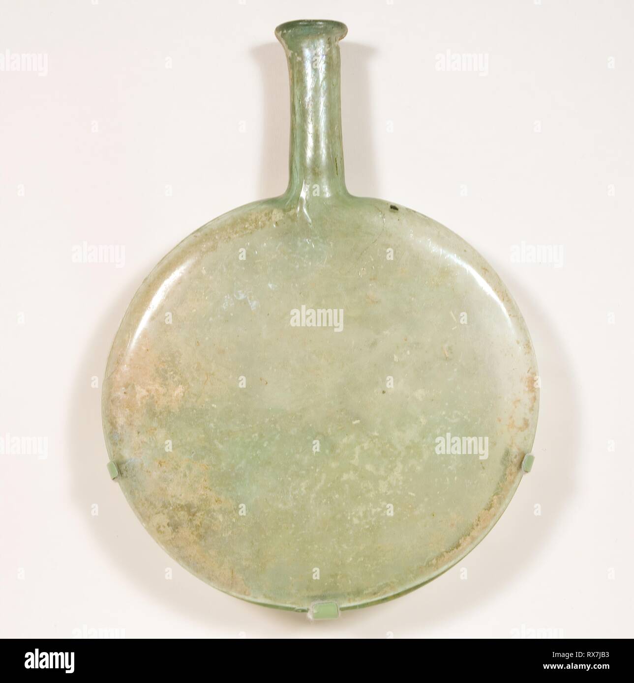 Flat Flask. Byzantine; Eastern Mediterranean. Date: 401 AD-600 AD. Dimensions: 23 × 17.1 × 2.8 cm (9 × 6 3/4 × 1 1/8 in.). Glass, blown technique. Origin: Byzantine Empire. Museum: The Chicago Art Institute. Stock Photo