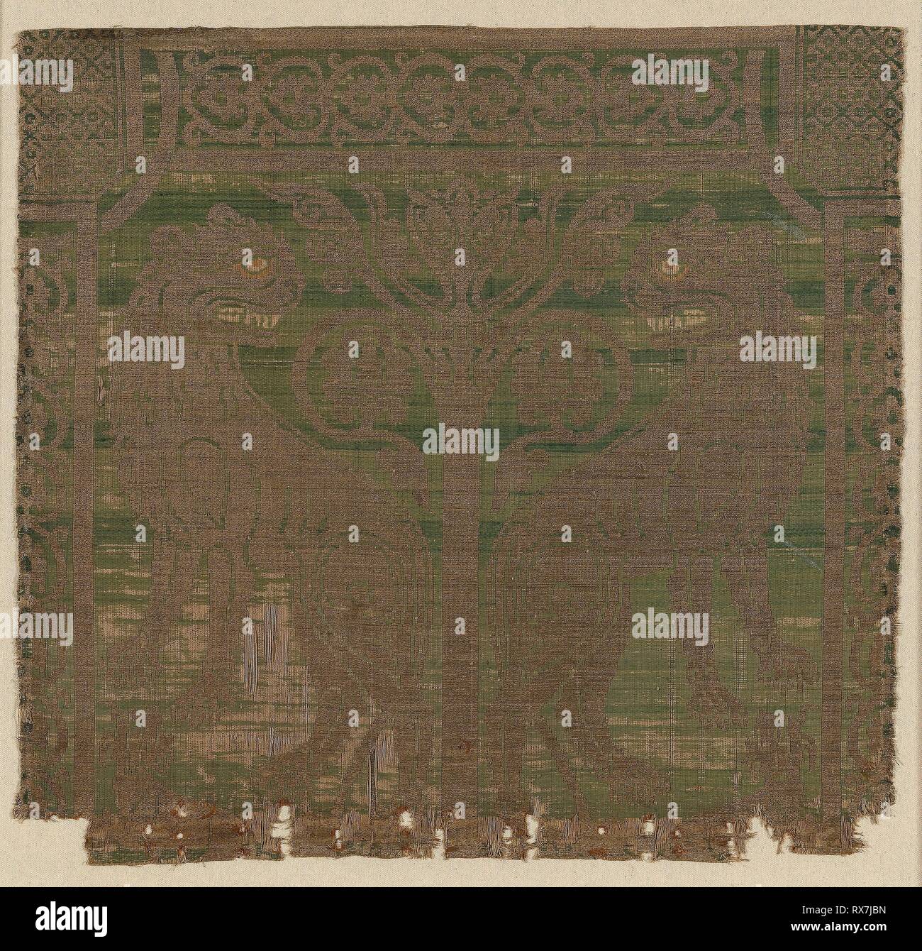 Fragment. Spain or Sicily. Date: 1201-1300. Dimensions: 57.4 x 60.9 cm (22 5/8 x 24 in.)  Weft: point repeat. Silk, linen, and gilt-animal-substrate-wrapped linen, complementary weft twill weave with inner warps. Origin: Spain. Museum: The Chicago Art Institute. Stock Photo