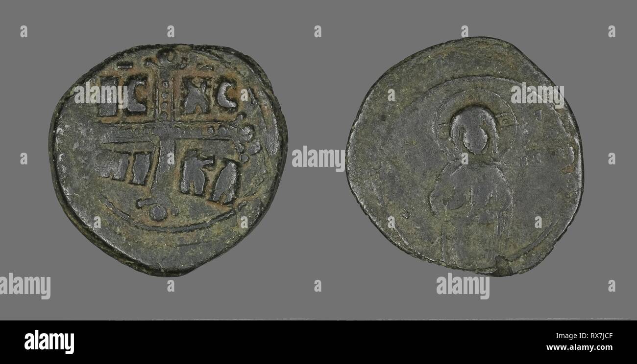 Anonymous Follis (Coin), Attributed to Theodora. Byzantine. Date: 1055-1056. Dimensions: Diam. 3 cm; 8.22 g. Bronze. Origin: Byzantine Empire. Museum: The Chicago Art Institute. Stock Photo
