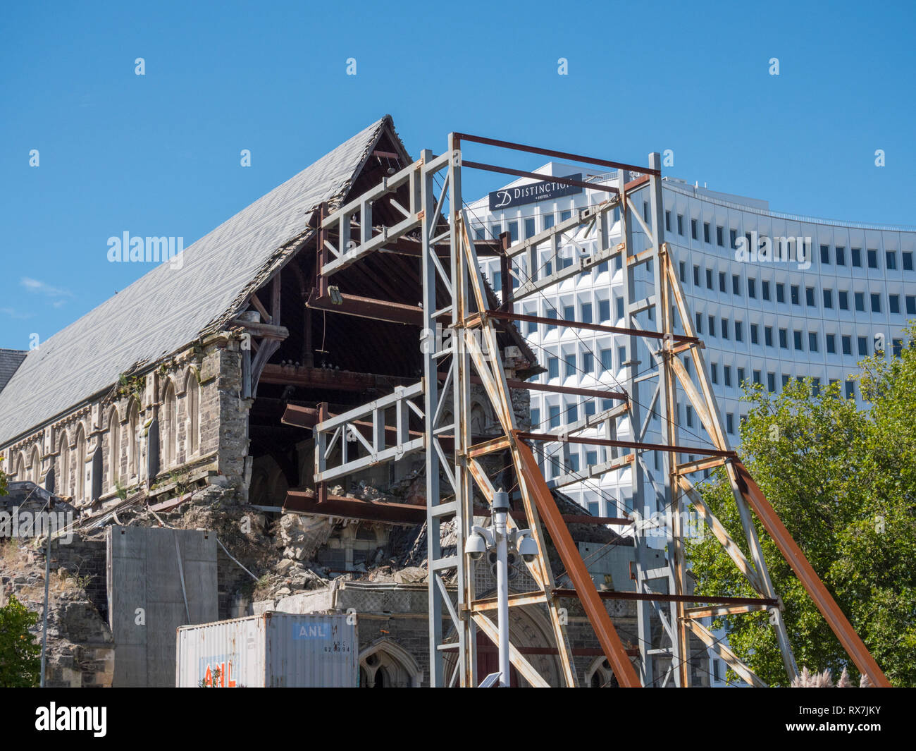 The earhquake damaged old Christchurch Cathedral New Zealand showing the metal protective scaffolding keeping it safe from further damage Stock Photo
