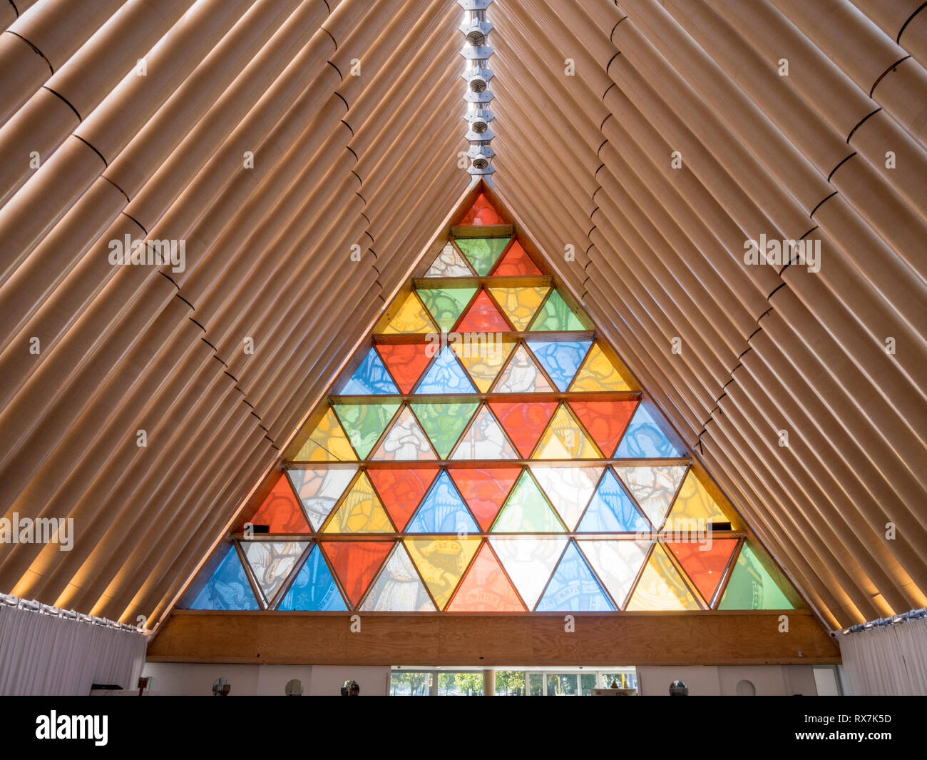 The stained glass window and roof inside the Transitional Cathedral