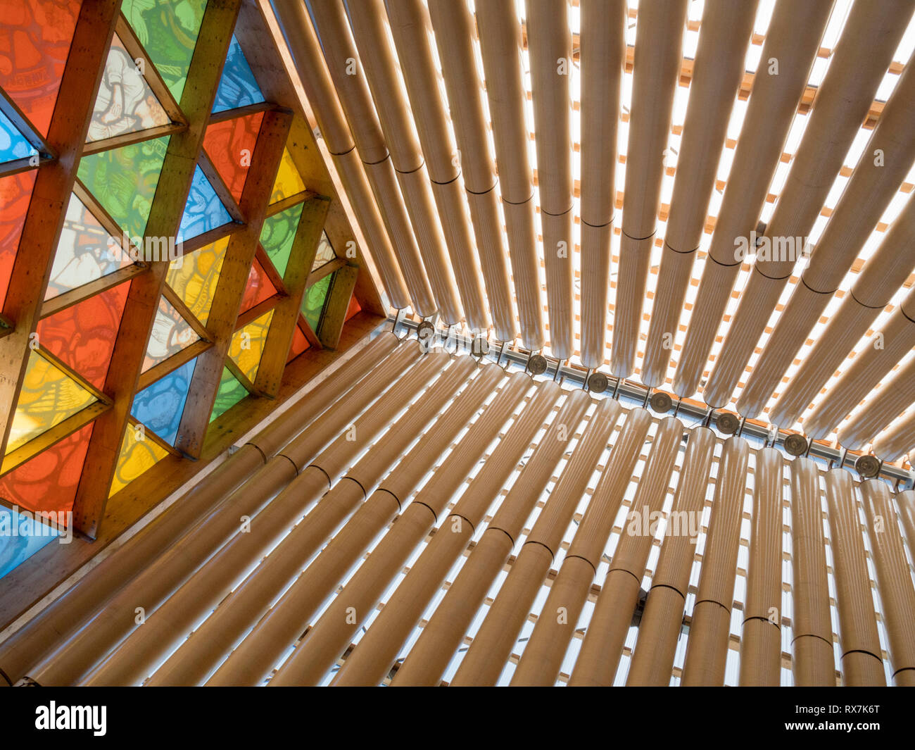 The stained glass window and roof inside the Transitional Cathedral