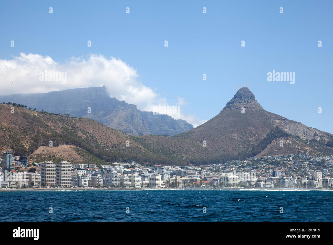 Properties on Seaside With Lions Head Behind in Cape Town, South Africa Stock Photo