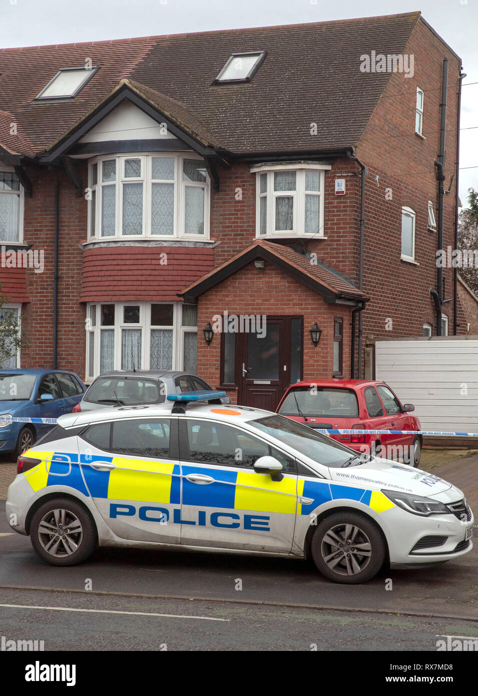 Police at the scene in Shaggy Calf Lane, Slough, Berkshire where a 12