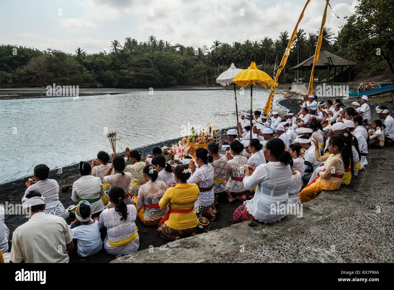 Balinese religious beach ceremony, Tabanan, Bail, Indonesia Stock Photo