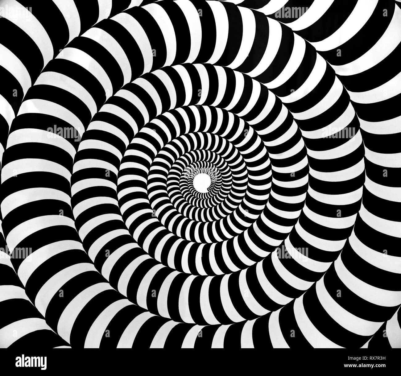 Black and white psychedelic hypnotic swirl pattern Stock Photo