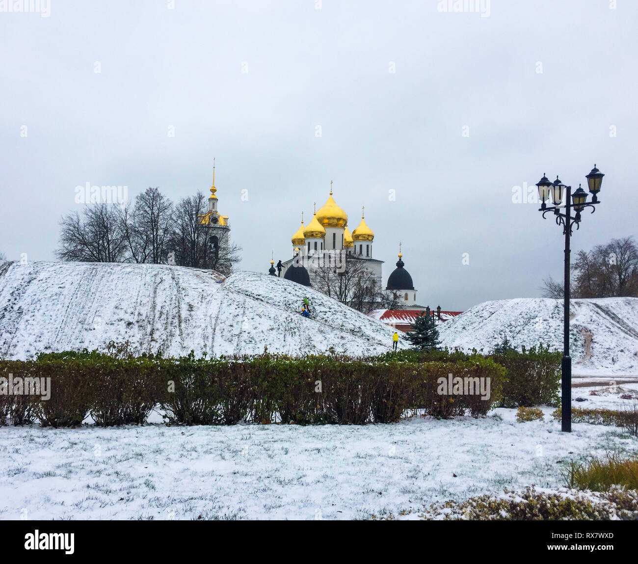 City shafts covered with snow and Assumption Cathedral in the Kremlin in Dmitrov, Moscow Region, Russia Stock Photo