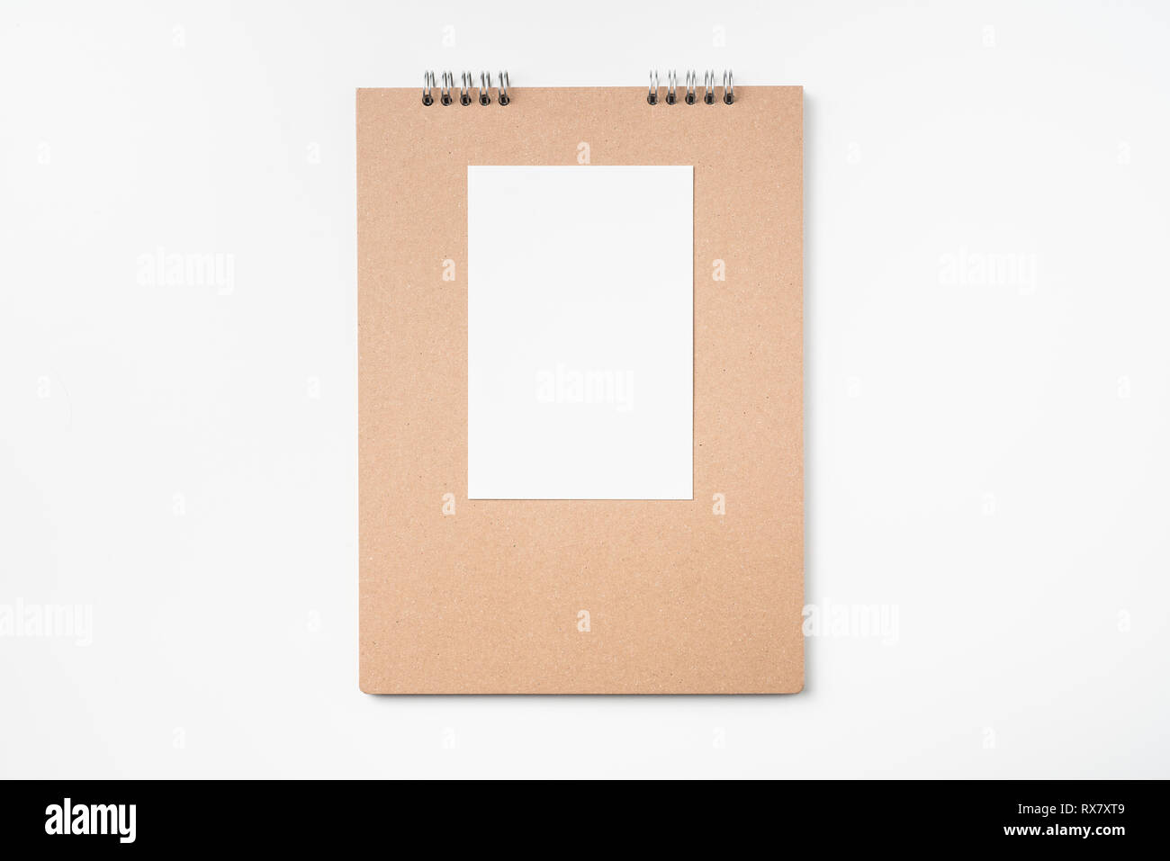 Design concept - Top view of kraft notebook, photo frame and pen ...
