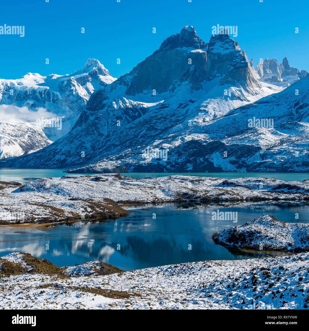 Nordenskjold Lake and Pehoe Lake with the Cuernos and Torres del Paine snowcapped peaks in winter, Torres del Paine national park, Patagonia, Chile. Stock Photo