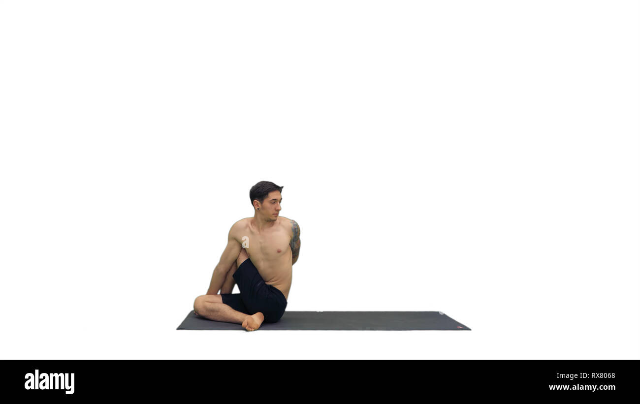 Man Practicing Yoga Stretching Torso On White Background