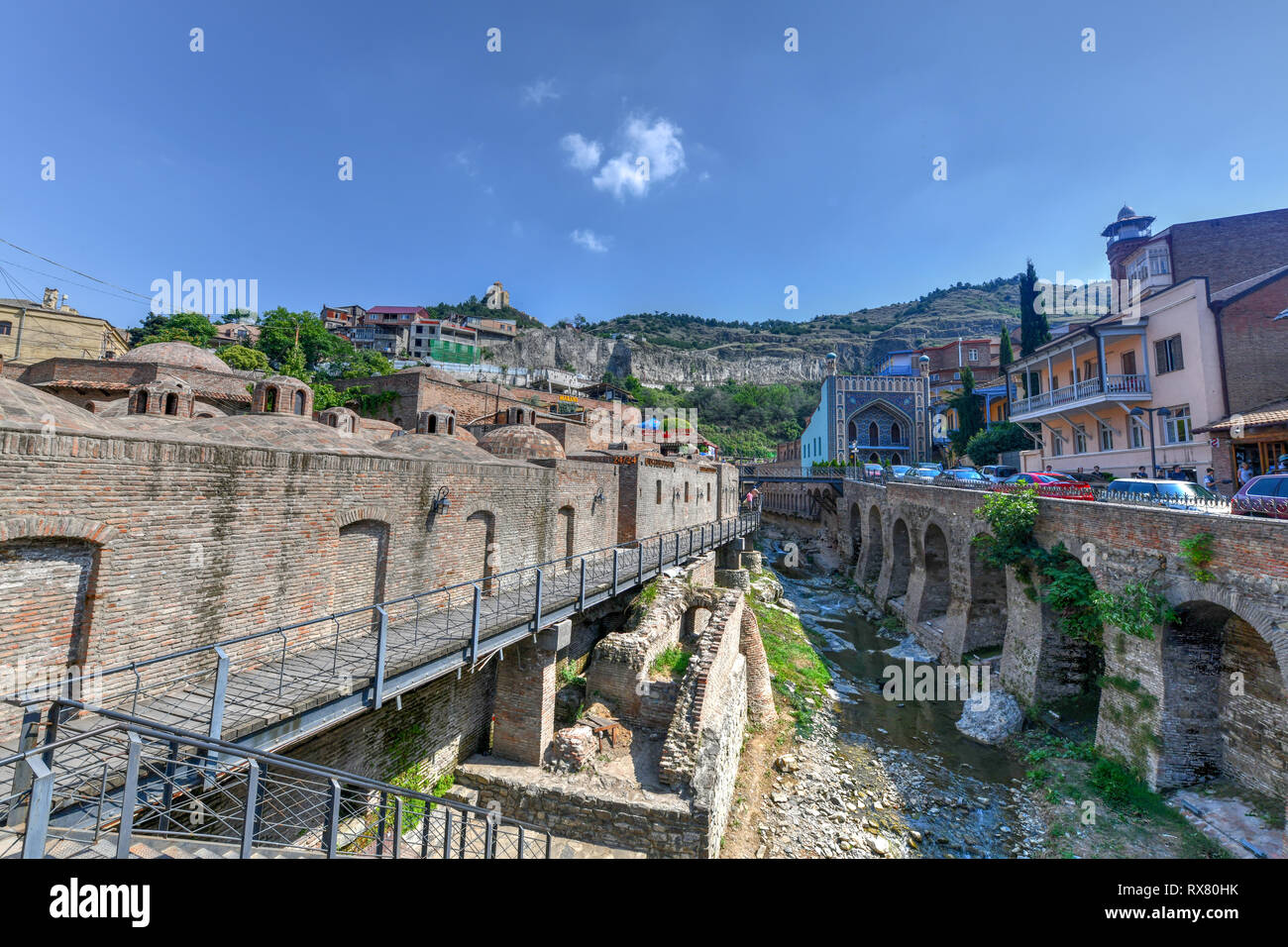 Tbilisi, Georgia - July 10, 2018: Famous sulphur baths with Orbeliani islamic mosque, traditional Tiflis architecture, carved wooden balconies at Aban Stock Photo