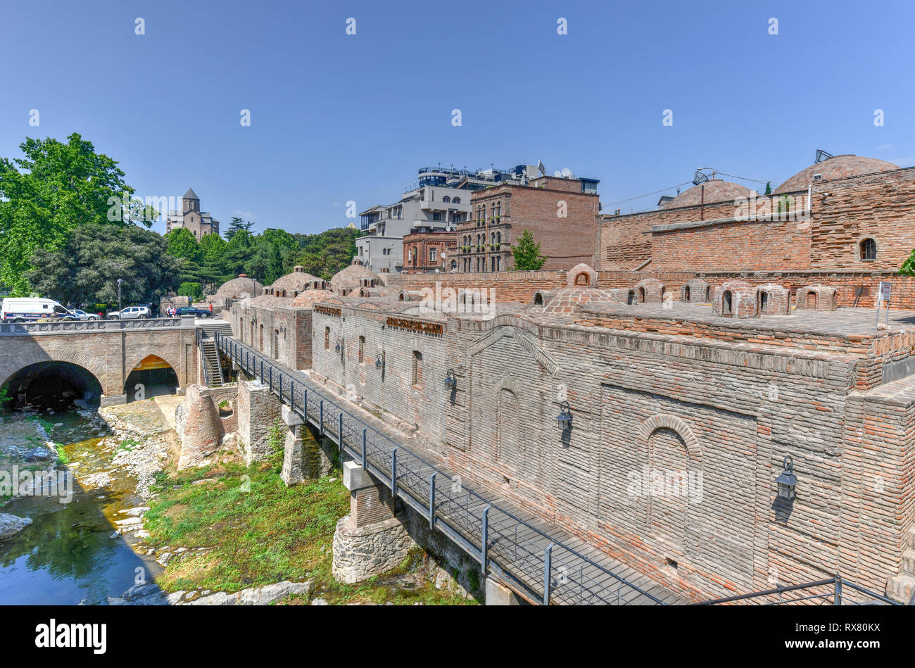 Tbilisi, Georgia - July 10, 2018: Famous sulphur baths with Orbeliani islamic mosque, traditional Tiflis architecture, carved wooden balconies at Aban Stock Photo