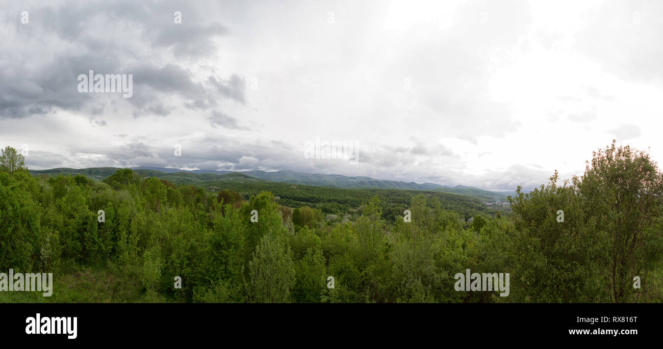 Spring landscape with Russian Caucasus green mountains Stock Photo - Alamy