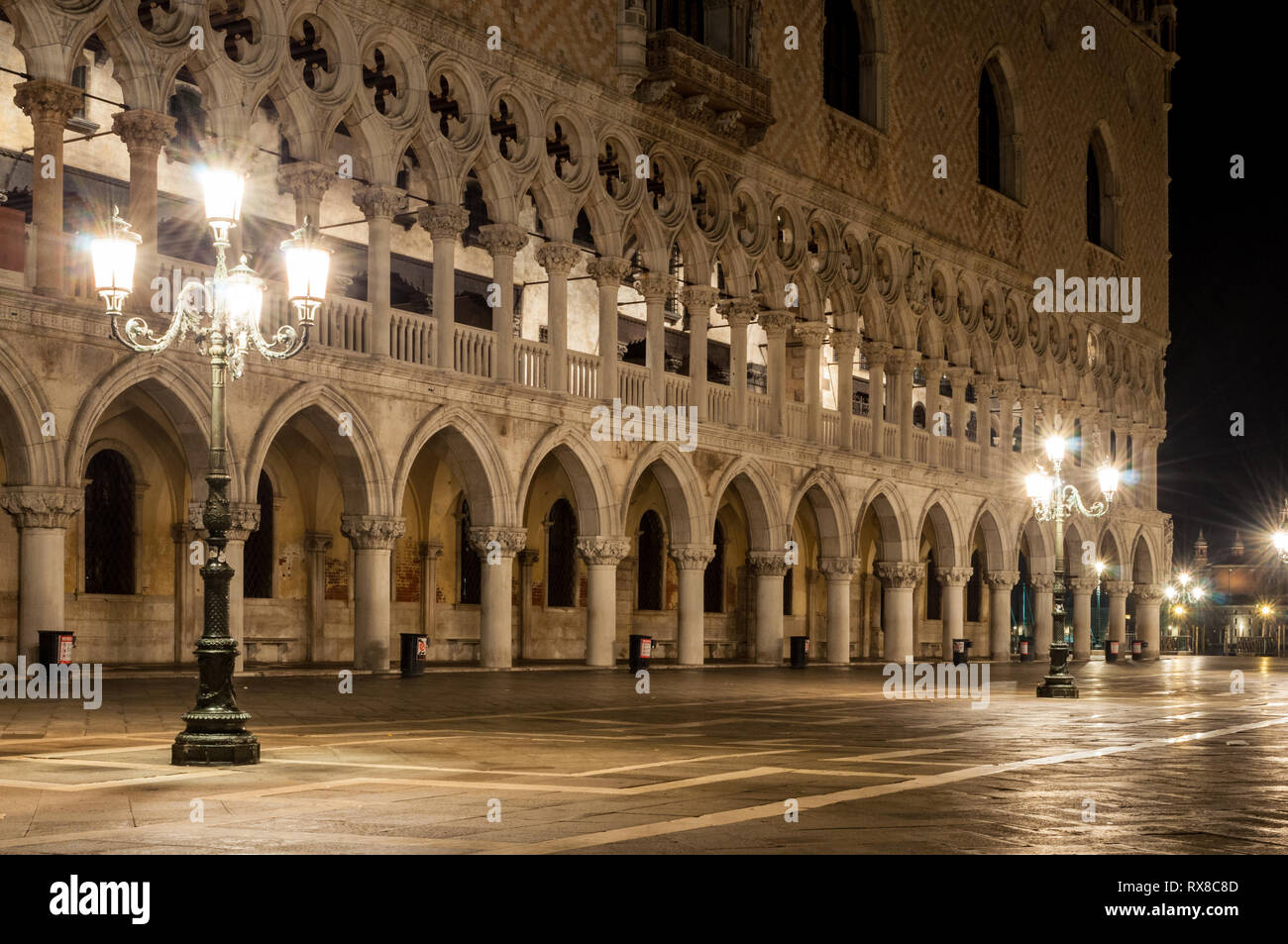 Doge Palace at night with light poles Venice Italy Stock Photo