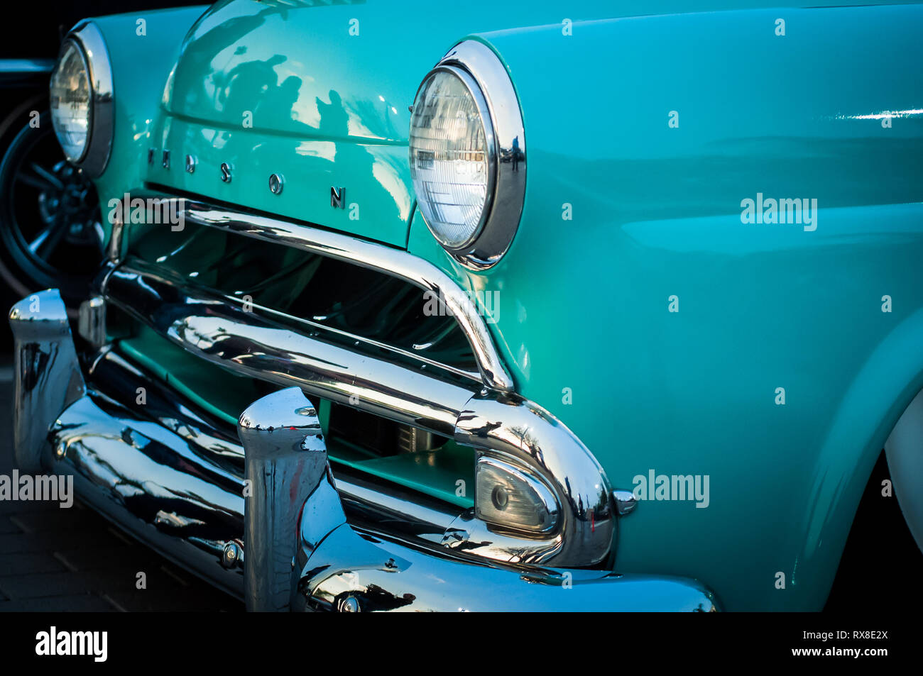 front chrome grill turquoise classic car Stock Photo