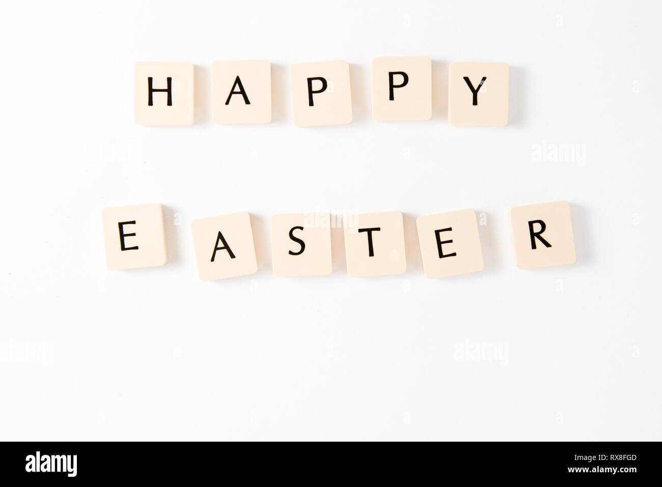 Inscription HAPPY EASTER - on white background. Stock Photo