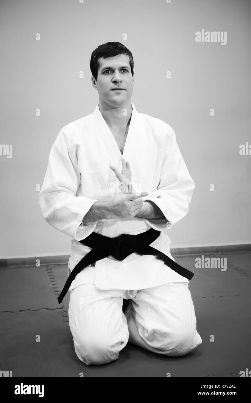 A Man, In A Black Kimono Is Practicing Martial Arts Technique With A Long  Bamboo Fighting Stick. Stock Photo, Picture and Royalty Free Image. Image  91980191.