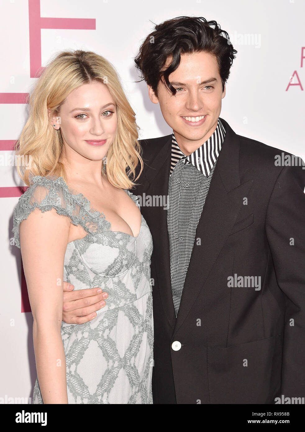 WESTWOOD, CA - MARCH 07: Lili Reinhart (L) and Cole Sprouse attend the