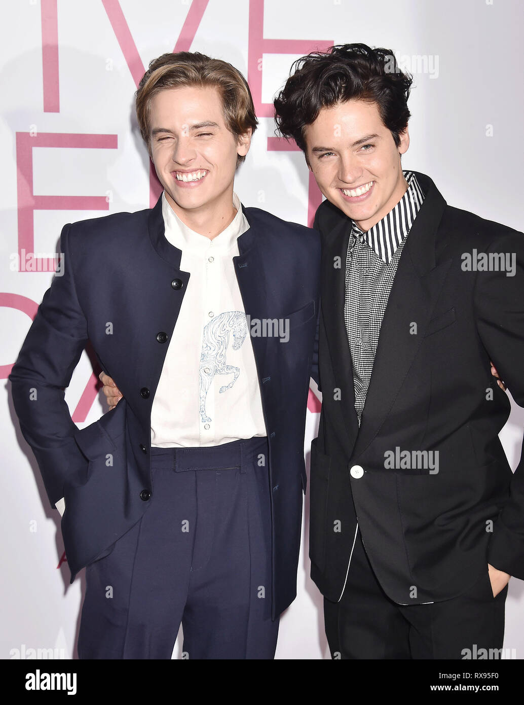 WESTWOOD, CA - MARCH 07: Dylan Spouse (L) and Cole Sprouse attend the Premiere Of Lionsgate's 'Five Feet Apart' at Fox Bruin Theatre on March 07, 2019 Stock Photo