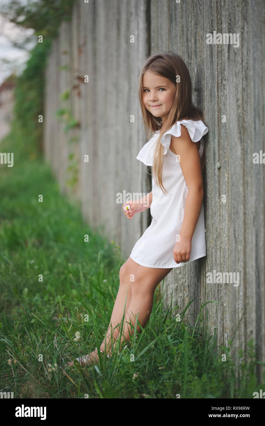 Little girl with long hair hi-res stock photography and images - Alamy