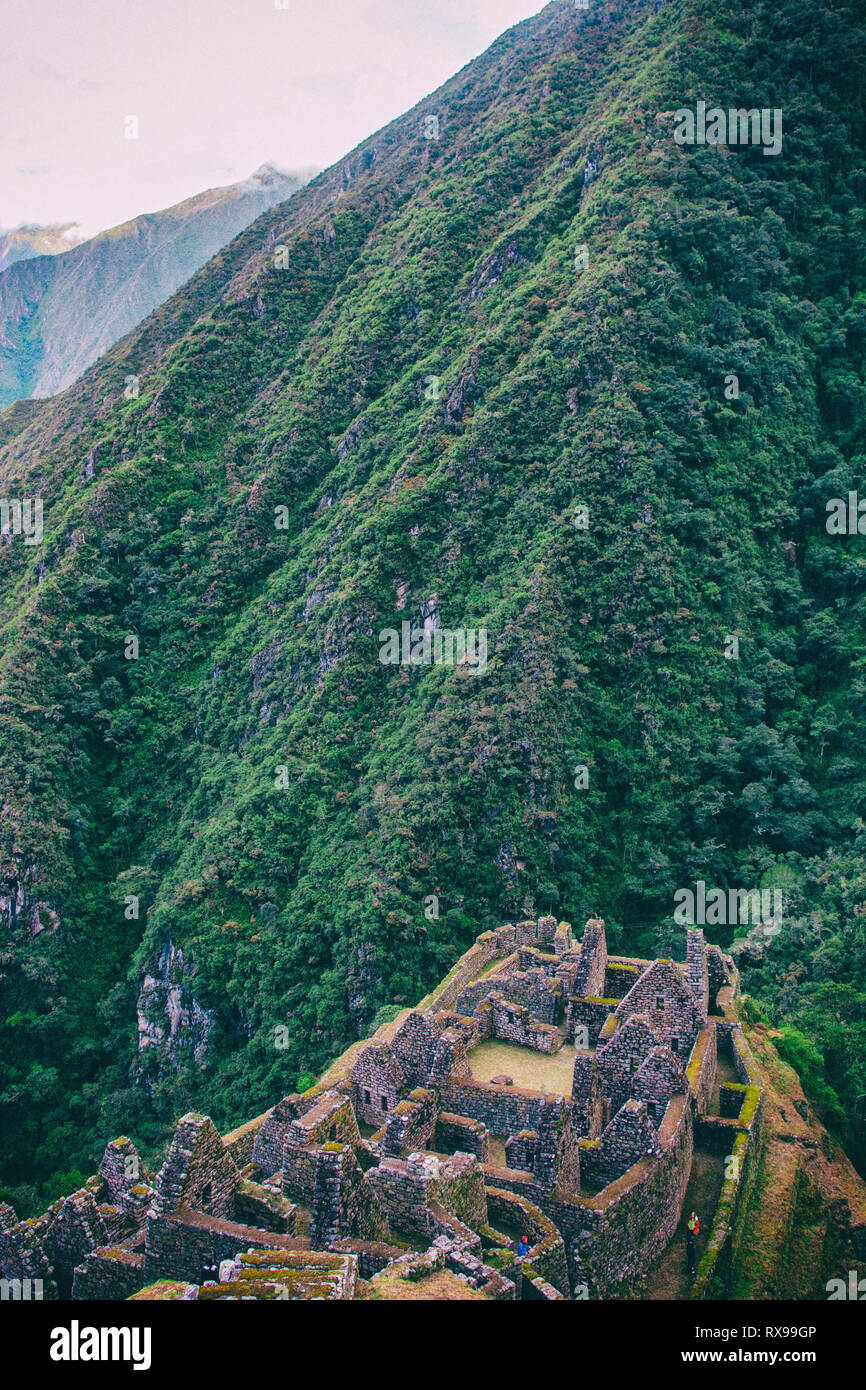 High angle view of old ruins against trees growing on Andes mountain Stock Photo