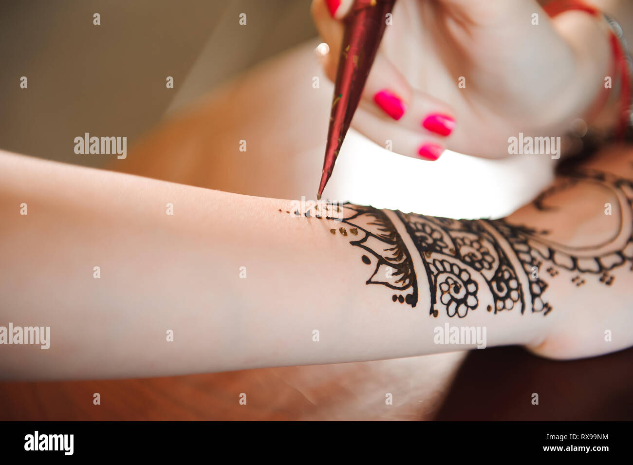 Mehndi is traditional Indian decorative art. Close-up Stock Photo
