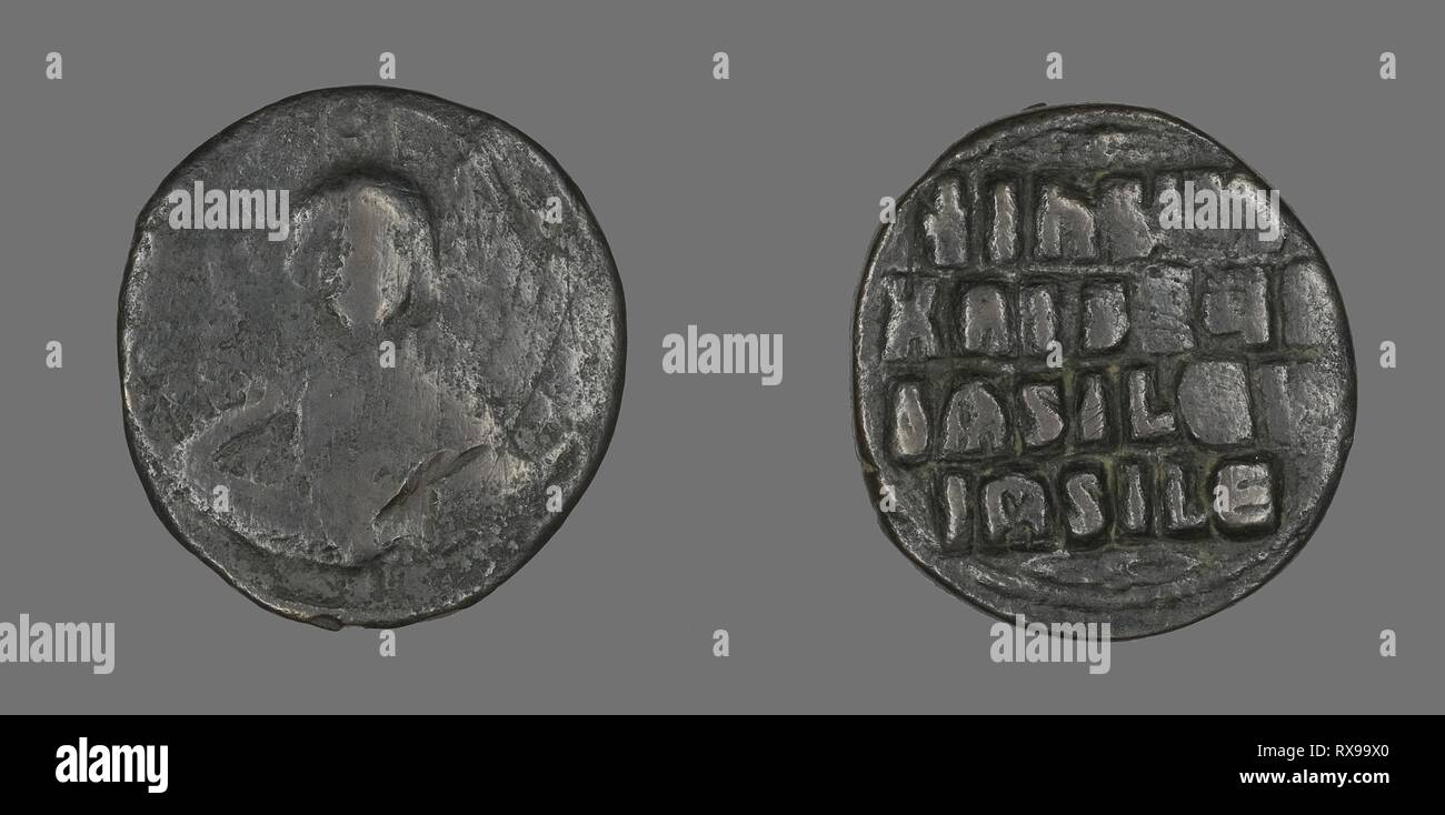 Anonymous Follis (Coin). Byzantine. Date: 976 AD-1028. Dimensions: Diam. 3 cm; 12.16 g. Bronze. Origin: Istanbul. Museum: The Chicago Art Institute. Stock Photo