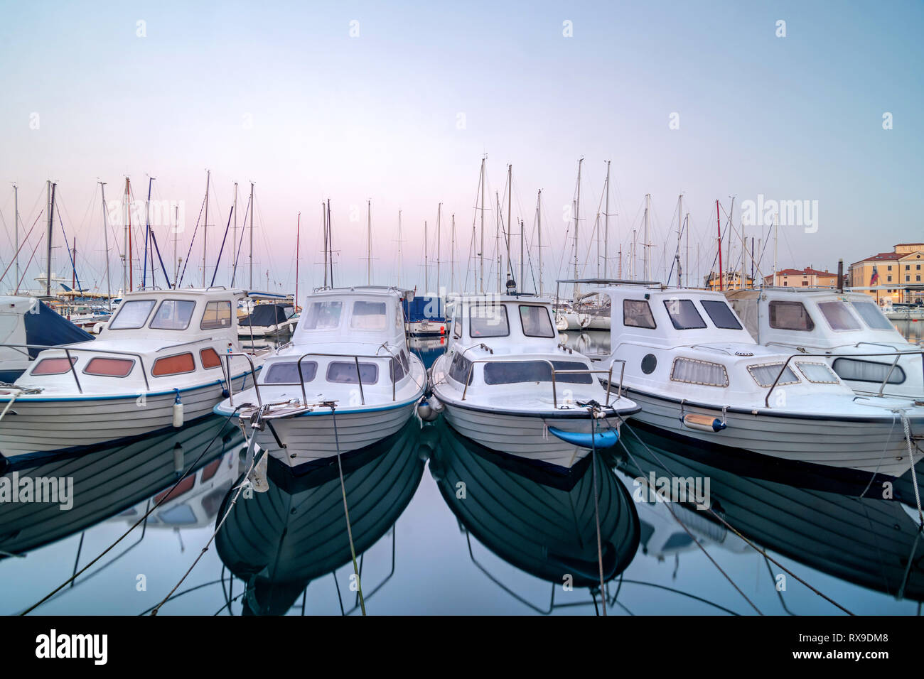 Coastal view docked boats hi-res stock photography and images - Alamy