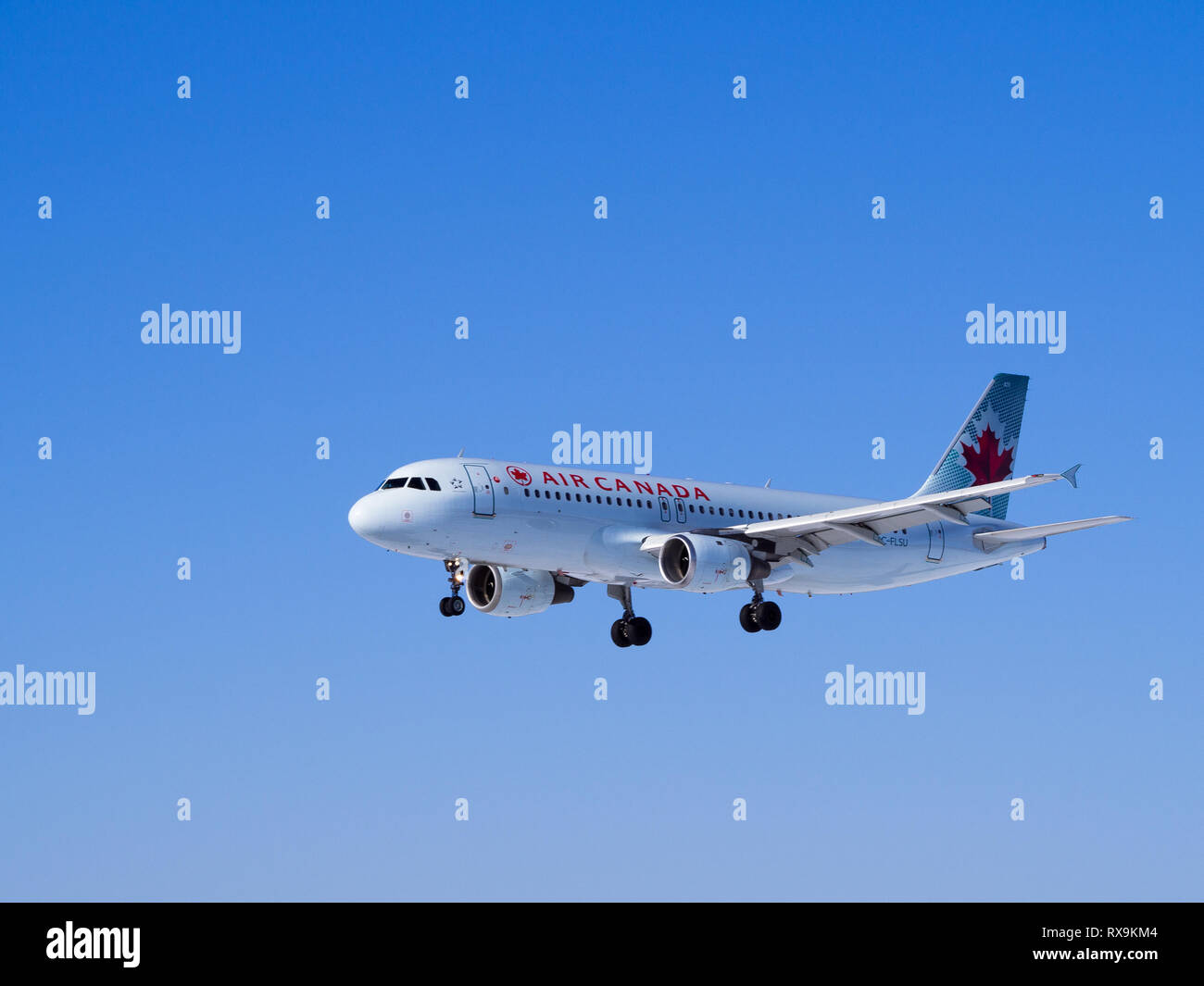Air Canada Airbus A320 landing at Ottawa International Airport in the beautiful day Stock Photo