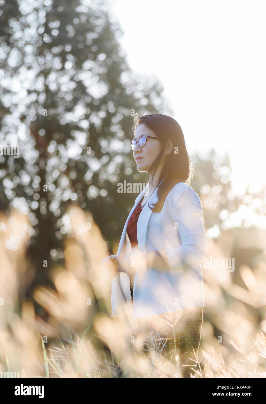 Mature woman side view thoughtful hi-res stock photography and images ...