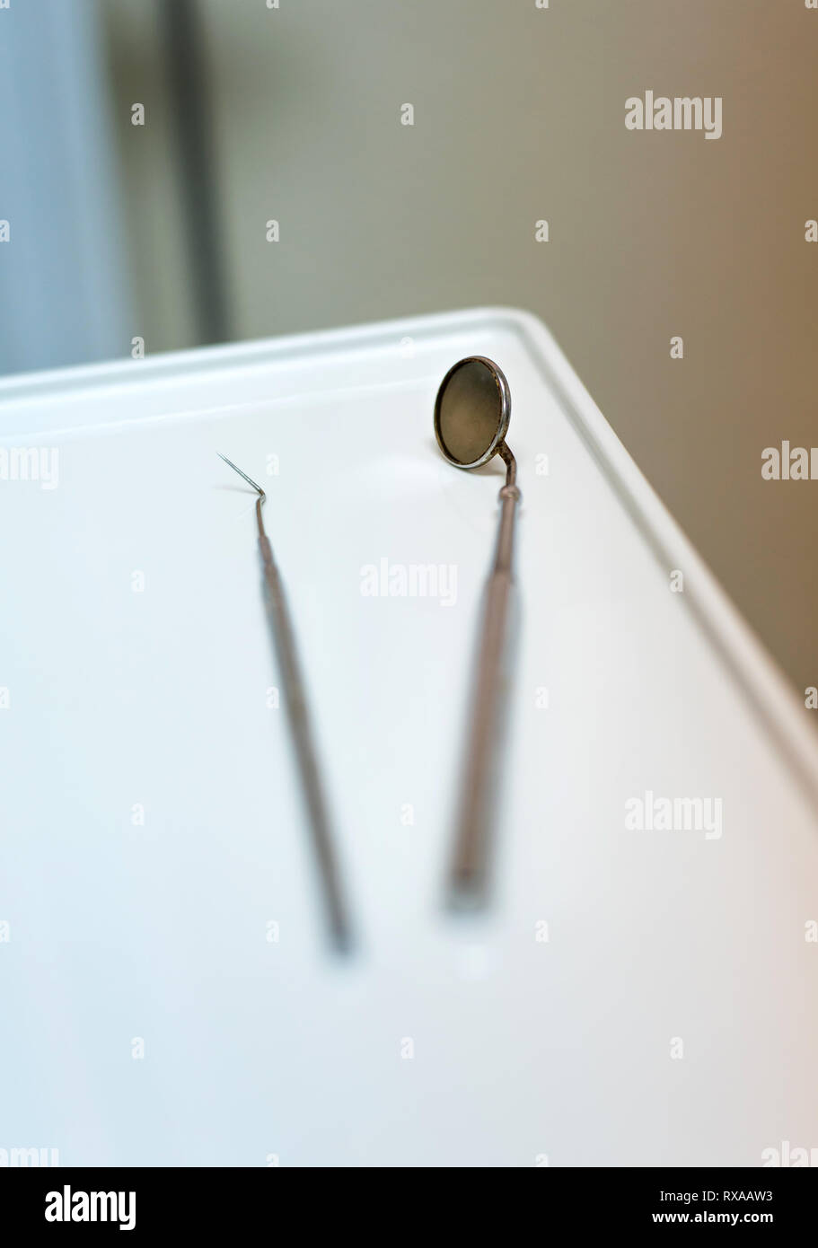 Dental mirror and a probe close up Stock Photo