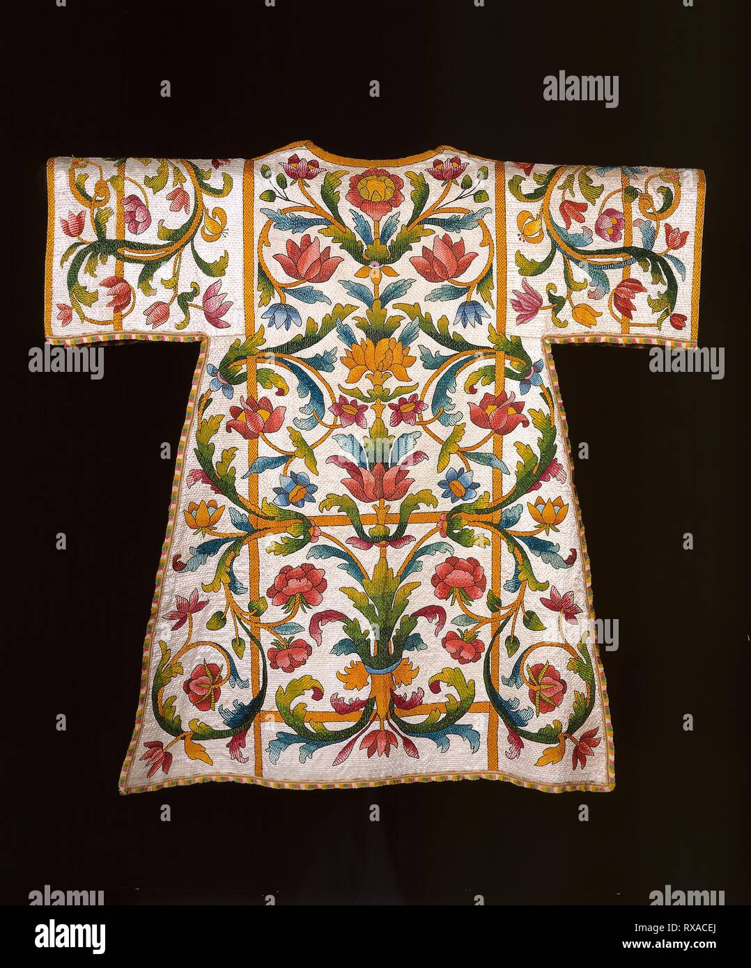 Dalmatic. Italy or Spain. Date: 1695-1705. Dimensions: 120.5 x 120.5 cm (47 1/4 x 47 1/2 in.). Hemp, plain weave; embroidered with silk in satin and split stitches; laid work and couching; edged with silk, warp-faced weft-ribbed plain weave extended weft cut woven fringe; lined with cotton, plain weave; glazed. Origin: Italy. Museum: The Chicago Art Institute. Stock Photo