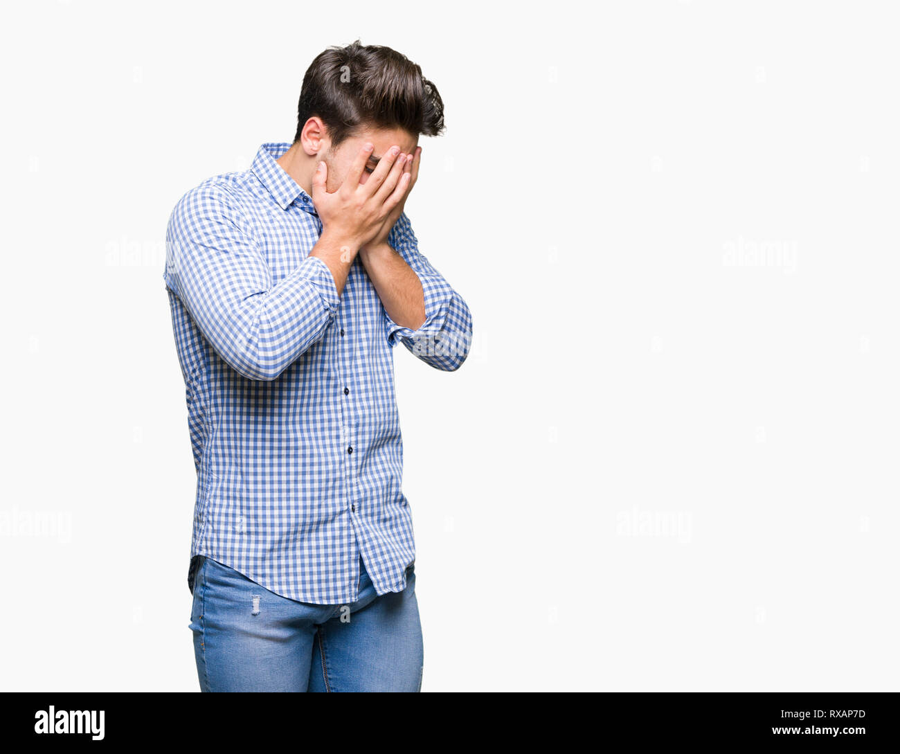 Young handsome business man over isolated background with sad expression covering face with hands while crying. Depression concept. Stock Photo